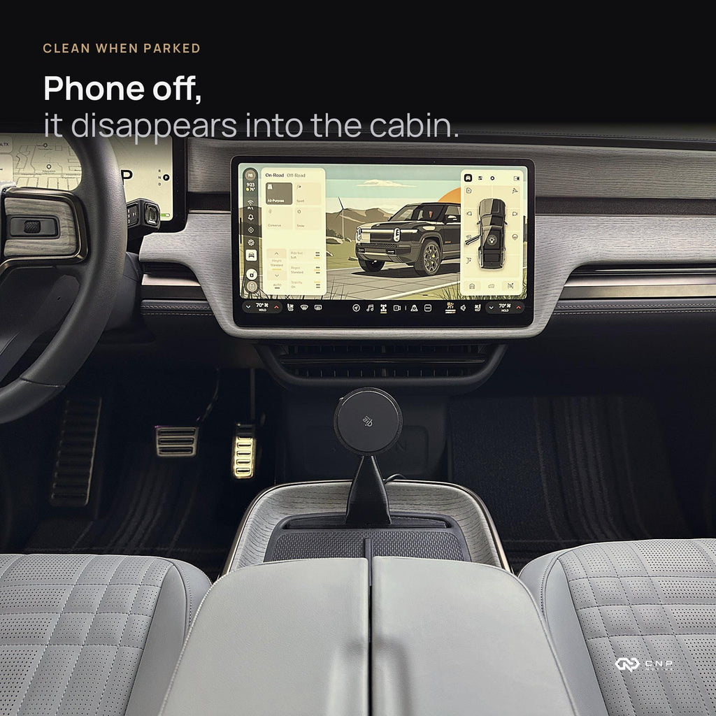 Rivian R1S interior with the MagSafe charging mount empty, sitting low in the console